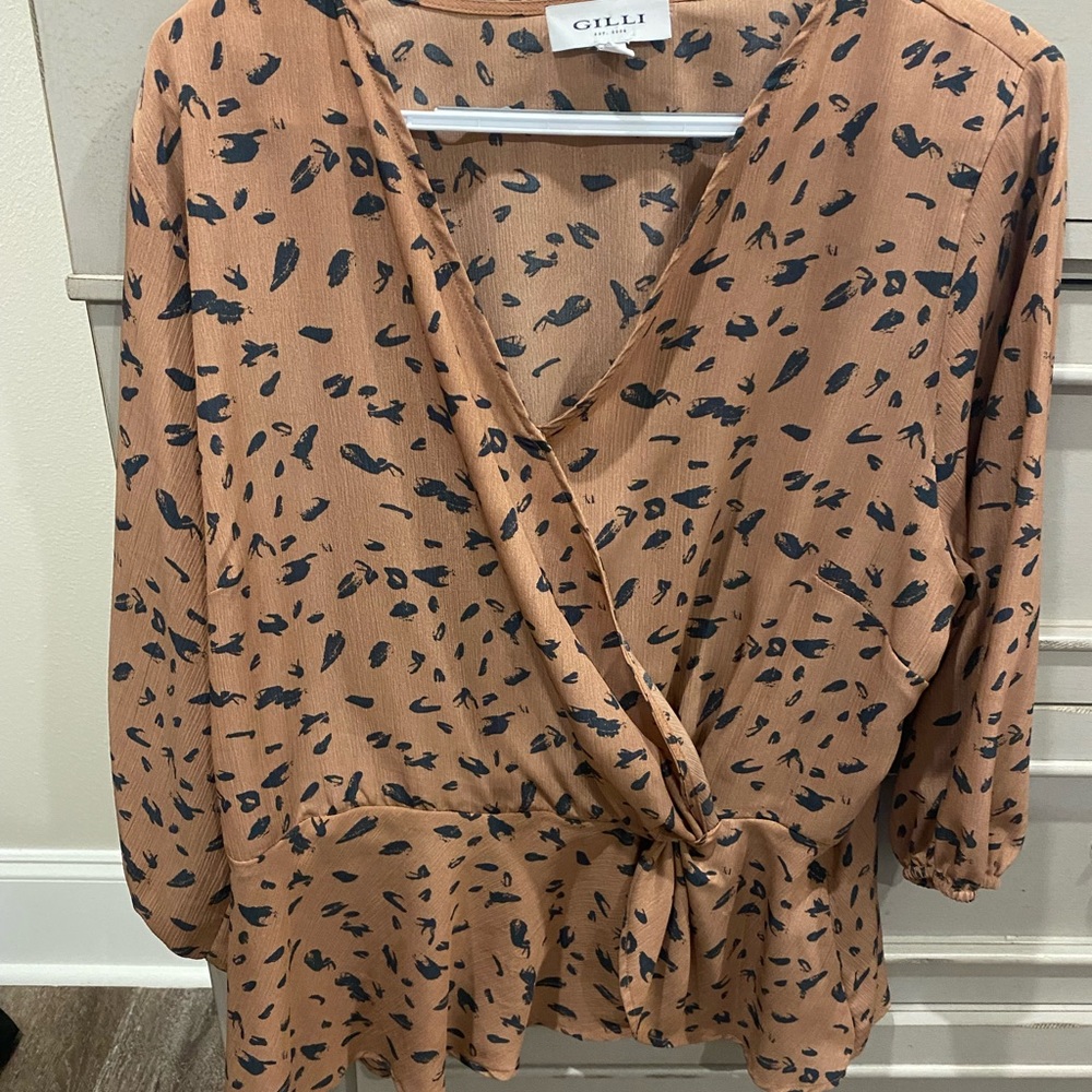 Animal print peplum blouse